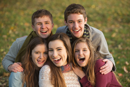 a group of teenagers with braces